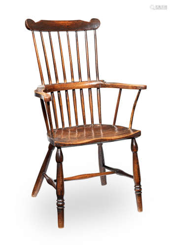 An early 19th century beech, ash and elm comb-back Windsor armchair, West Country, circa 1820-50