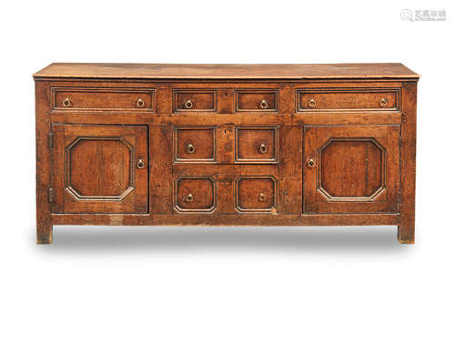 A William & Mary joined oak fuly-enclosed dresser base, circa 1700