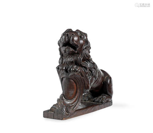 A 17th century carved oak mount or finial