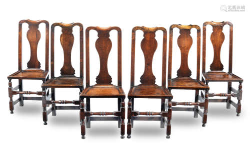 A set of six George I joined oak dining chairs, circa 1720