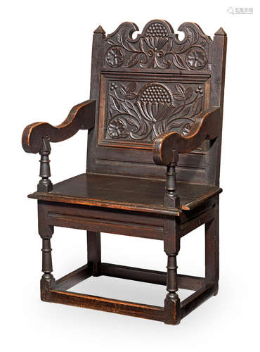 A Charles II joined oak panel-back open armchair, Cheshire/Lancashire, circa 1670