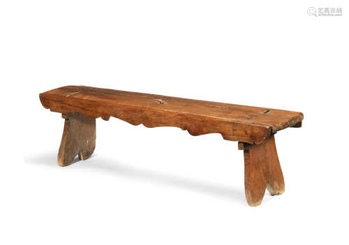 A late 16th/early 17th century walnut boarded bench, North European, probably French, circa 1600