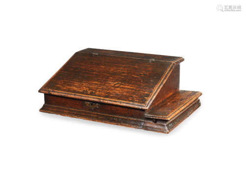 A late 17th century joined and boarded oak desk box, circa 1680