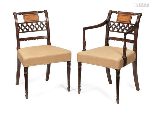 A set of ten late George III mahogany and satinwood inlaid dining chairs