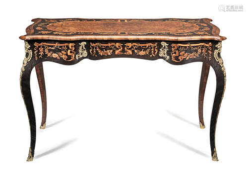 almost certainly retailed by Edward Holmes Baldock An early Victorian walnut, ebonised, stained sycamore and marquetry writing table