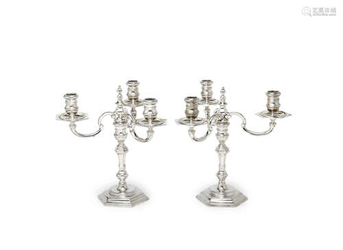 mark of R Comyns overstriking that of another London 1966  A pair of silver three-light candelabra