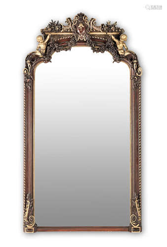 A very large Italian 19th century simulated rosewood decorated, parcel gilt and composition mirror