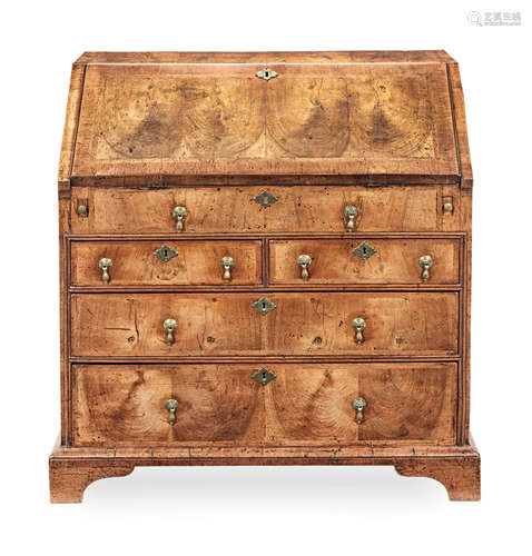 A Queen Anne walnut and featherbanded bureau