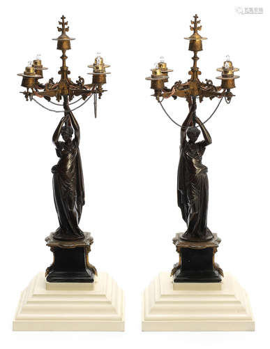 in the neo-grec style After Jules Salmson (French 1823 - 1902): A pair of late 19th century patinated bronze and slate figural garniture candelabra