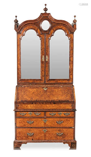 A George I burr walnut, walnut and featherbanded bureau cabinet