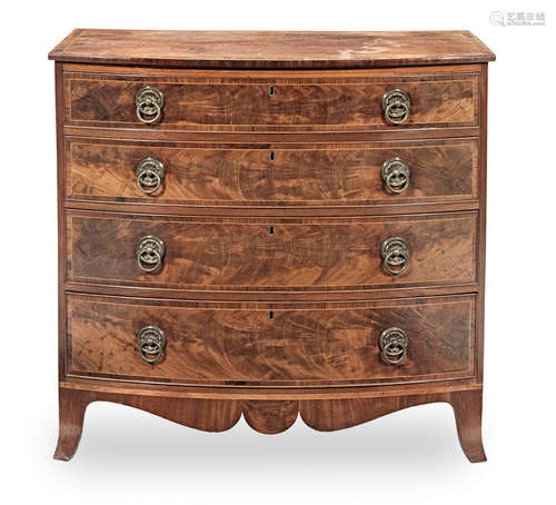 A Regency mahogany and rosewood crossbanded bowfront chest