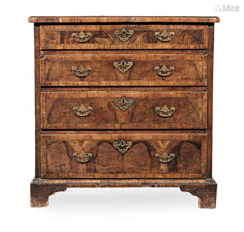 A George II figured walnut and featherbanded chest