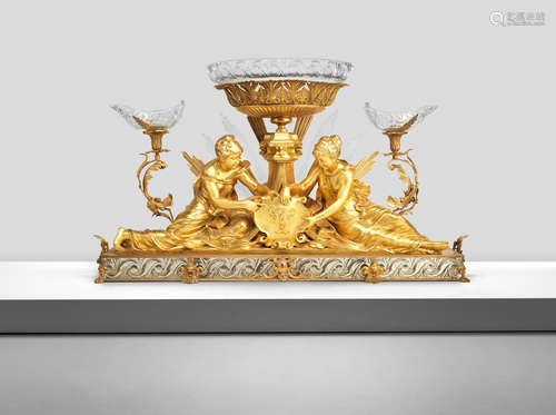 parts 19th century and later, the glass in the Baccarat style An impressive Continental gilt gesso and carved wood, gilt bronze and cut glass figural centrepiece