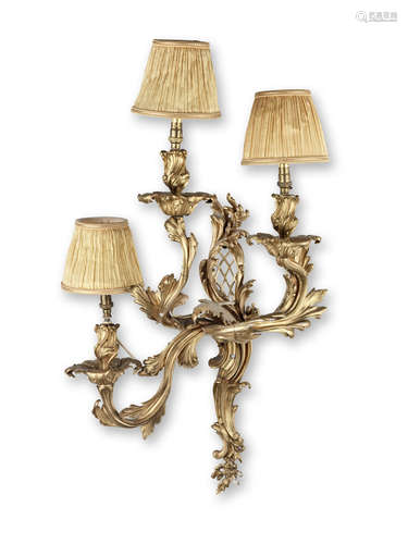 A pair of impressive French gilt bronze three light wall appliques