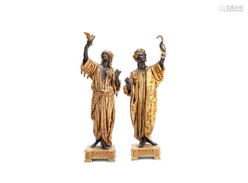 Anatole Jean Thomas Guillot (French, 1865-1911): A pair of late 19th / early 20th century coldpainted spelter orientalist figures of Arab traders