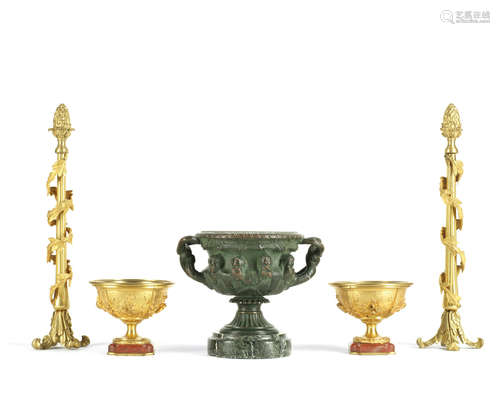 A pair of late 19th century Barbedienne gilt bronze miniature tazza together with a similar period patinated model of the Warwick vase and pair of later gilt bronze Thrysus mantel ornaments