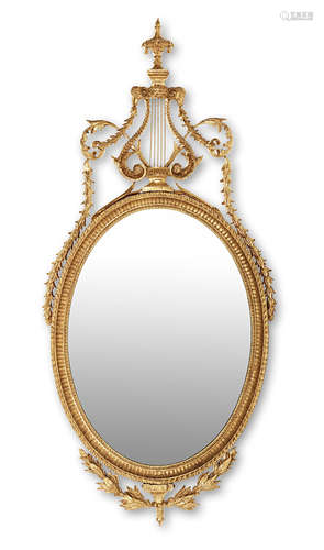 in the George III Neoclassical style A carved giltwood mirror