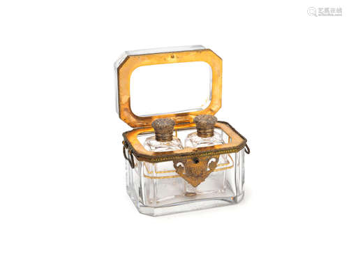 An early 19th century Palais Royal type gilt metal and cut glass scent bottle casket, together with a similar period rosewood toilet bottle casket