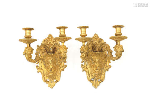 in the Louis XIV style A pair of gilt bronze twin wall lights