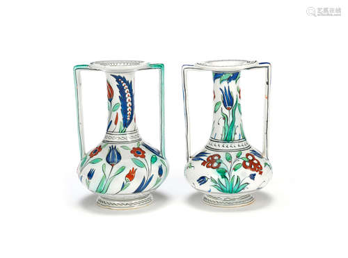 A pair ofy late 19th / early 20th century Cantagalli Iznik-style tin glazed pottery vases