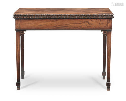 A George III carved mahogany card table