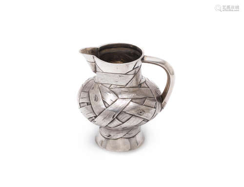 maker's mark possibly 'AЯC', for Arseny Yakovlevich Sokolov, St. Petersburg 1875  A Russian silver trompe l'oeil jug