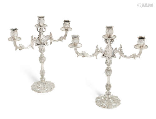 candlesticks by Samuel Roberts & Co, Sheffield 1847, branch sections by Edward & John Barnard, London, no apparent date letter  (4) A pair of Victorian silver candlesticks with matched cast silver branch sections