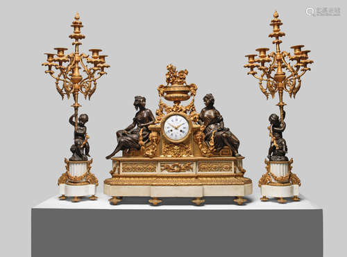 the clock signed to the dial L. Marchand A Paris, Rue Richelieu 57, A Napoleon III gilt and patinated bronze and white marble clock together with a pair of six light garniture candelabra en-suite