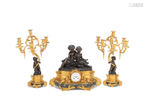 the dial and movement signed Dernière, Frais De Bronzes, A Paris A late 19th century French patinated and gilt bronze and Verde antico marble figural clock garniture