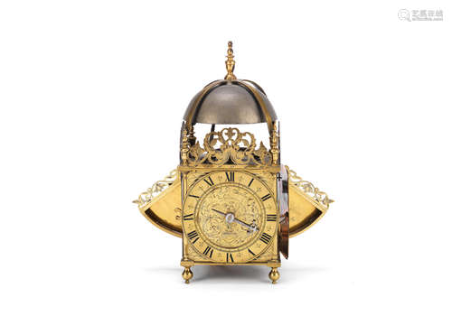 the dial signed Edward Santon Londini   A winged brass lantern clock