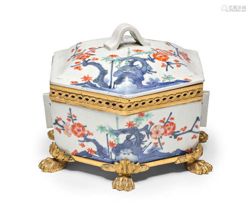 Hizen ware, Kakiemon type, Edo period (1615-1868), late 17th century, the mounts 19th century A Kakiemon Hexagonal Box and Cover with French Ormolu Mounts