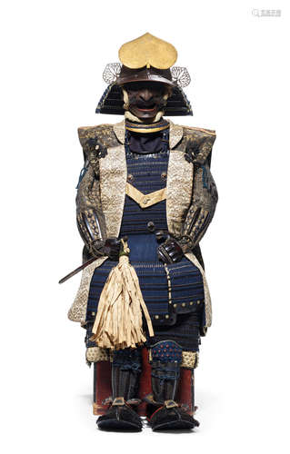 The helmet by Nagamichi, Edo period (1615-1868), 18th century A blue-laced armor with a Myochin helmet