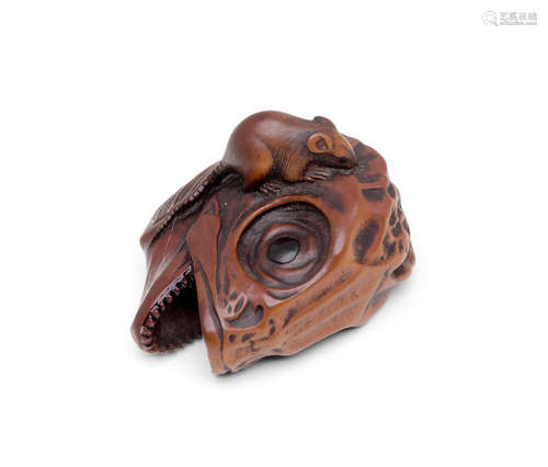 A wood netsuke of a salmon headEdo period (1615-1868) or Meiji era (1868-1912), 19th century Masakatsu (1839-1899)