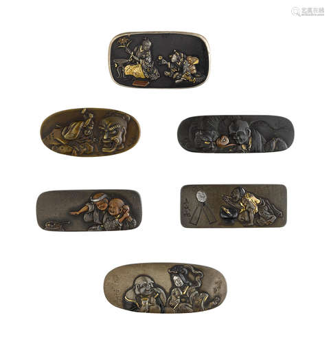 The fourth by Ryumin, Edo period (1615-1868), 19th century A group of six kanamono (metal fittings) from tobacco pouches