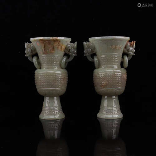 17-19TH CENTURY, A PAIR OF DOUBLE-EAR HETIAN JADE VASES, QING DYNASTY