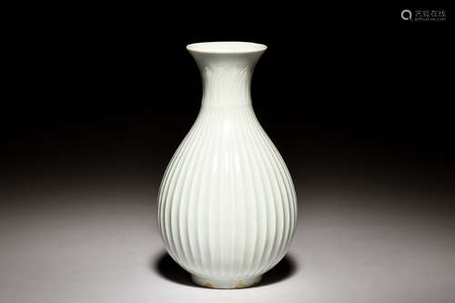 CELADON GLAZED 'FLOWER PETALS' BOTTLE VASE