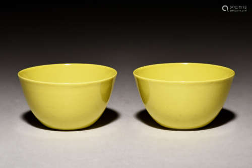 PAIR OF BRIGHT YELLOW MONOCHROME GLAZED CUPS