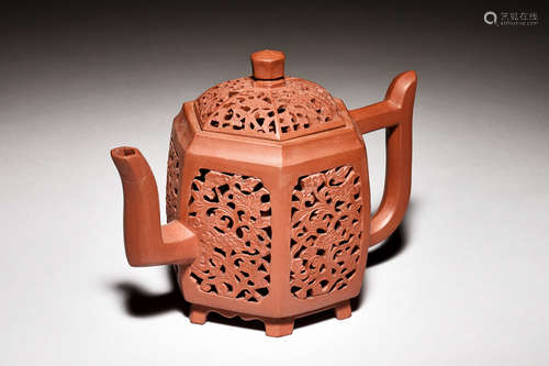 YIXING ZISHA OPENWORK CARVED 'FLOWERS' HEXAGONAL TEAPOT