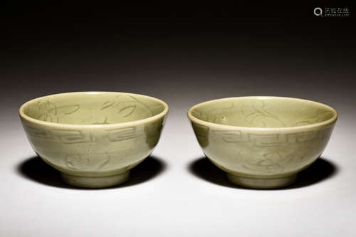 PAIR OF CELADON GLAZED AND CARVED BOWLS