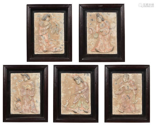 GROUP OF FIVE FRAMED 'PEOPLE' STONE WALL MURAL