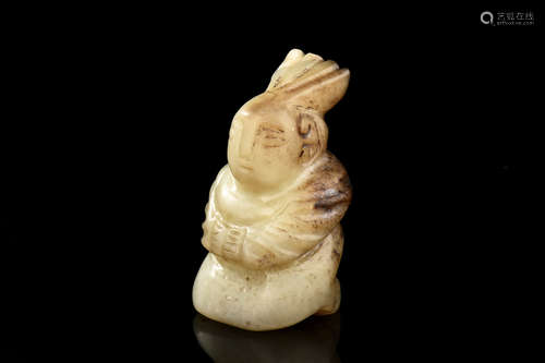 HETIAN JADE CARVED 'KNEELING MAN' FIGURE