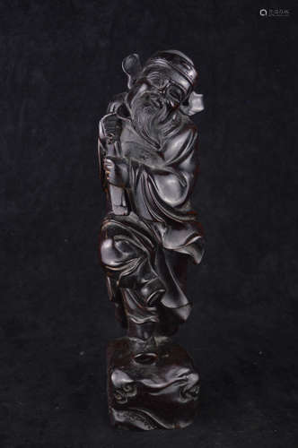 A TAOIST CAO IMMORTAL SHAPED WOOD CARVING