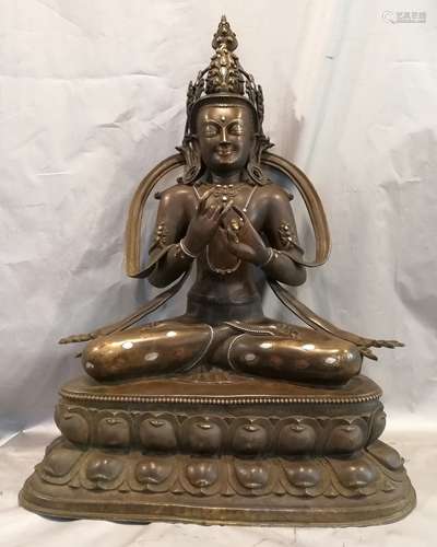 A BRONZE GILT MAITREYA BUDDHA