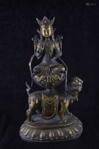 A GILT BRONZE MOLDED BUDDHA STATUE