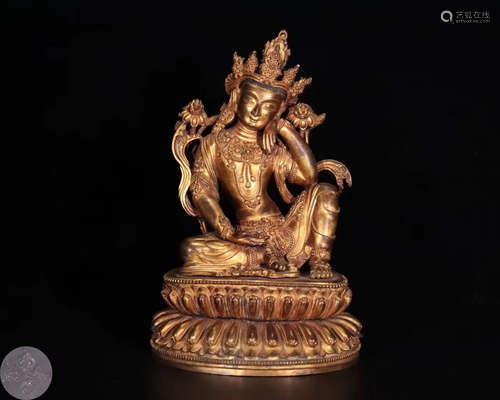 A GILT BRONZE TIBETAN BUDDHA STATUE