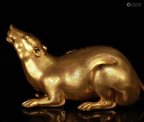 A GILT BRONZE RAT SHAPED FIGURE