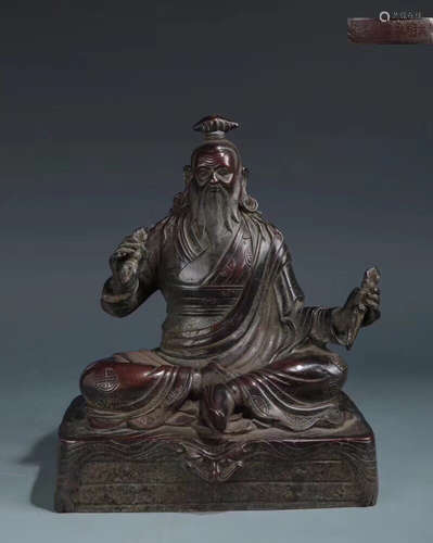 A BRONZE DAOZI FIGURE