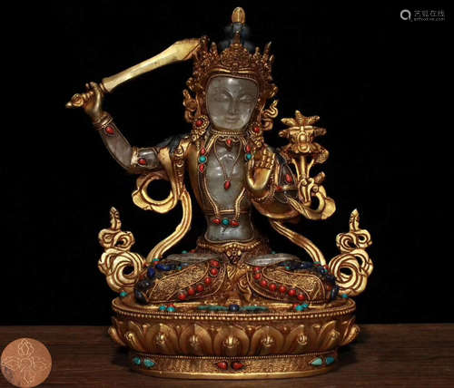 A NEPAL HANDMADE BRONZE AND CRYSTAL BUDDHA STATUE