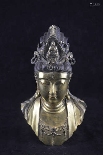 A GILT BRONZE MOLDED GUANYIN HEAD STATUE