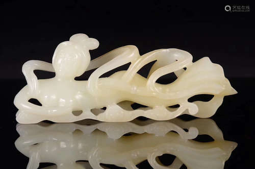 A HETIAN JADE FLYING FAIRY SHAPED FIGURE